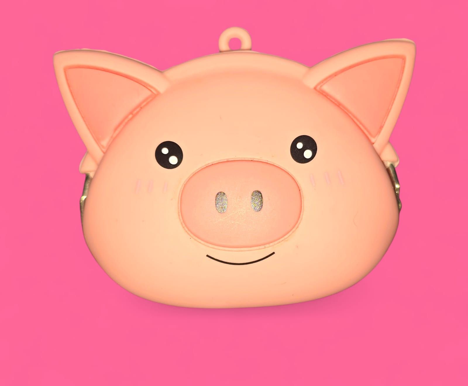 Monedero de chanchito rosado