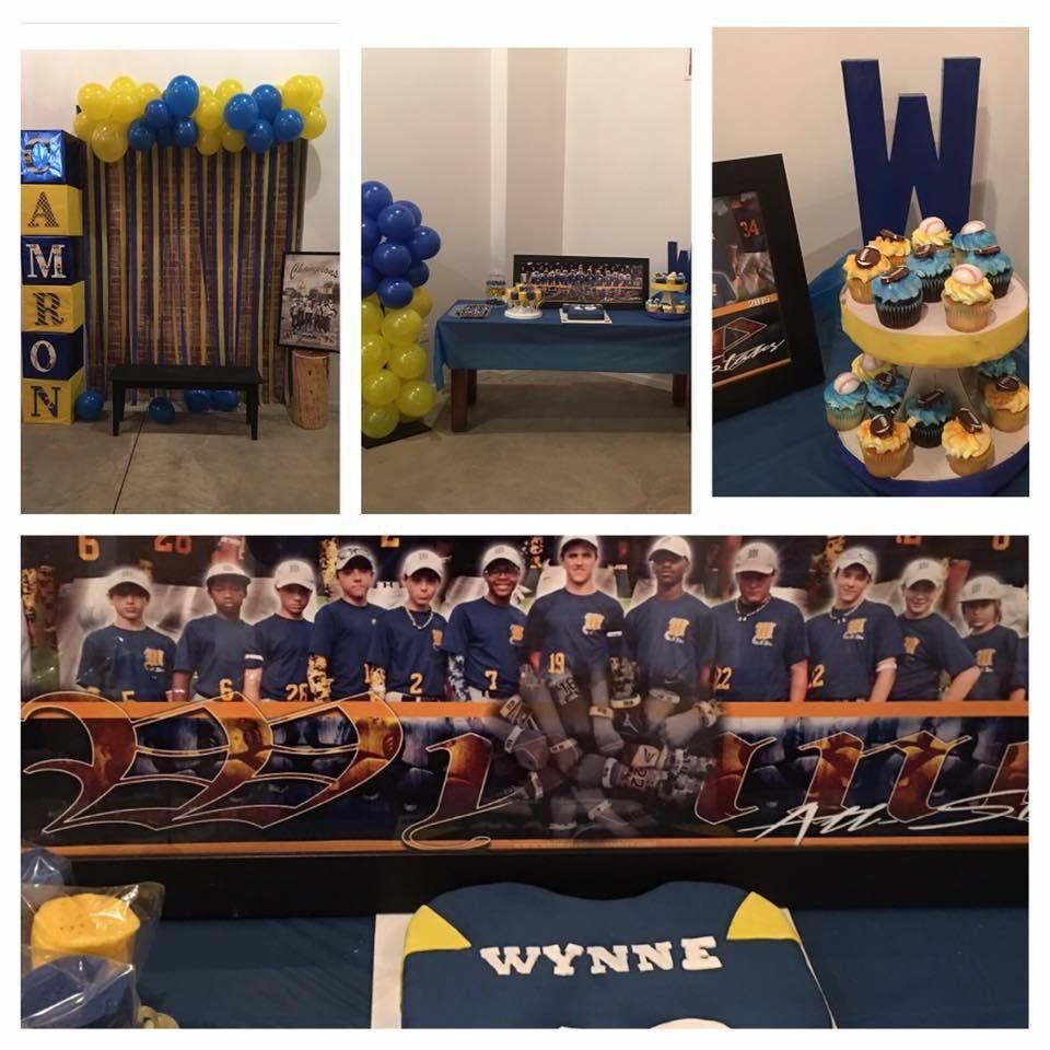 Blue and gold sports-themed graduation display with balloons, cake, team banner, and photo collage