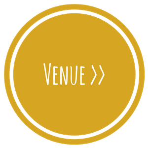 White “Venue >>” text on a gold circular button with a white double border.