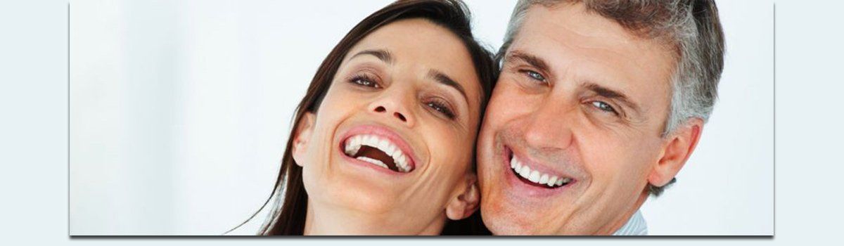 bedford fair dental surgery smiling man and woman smiling