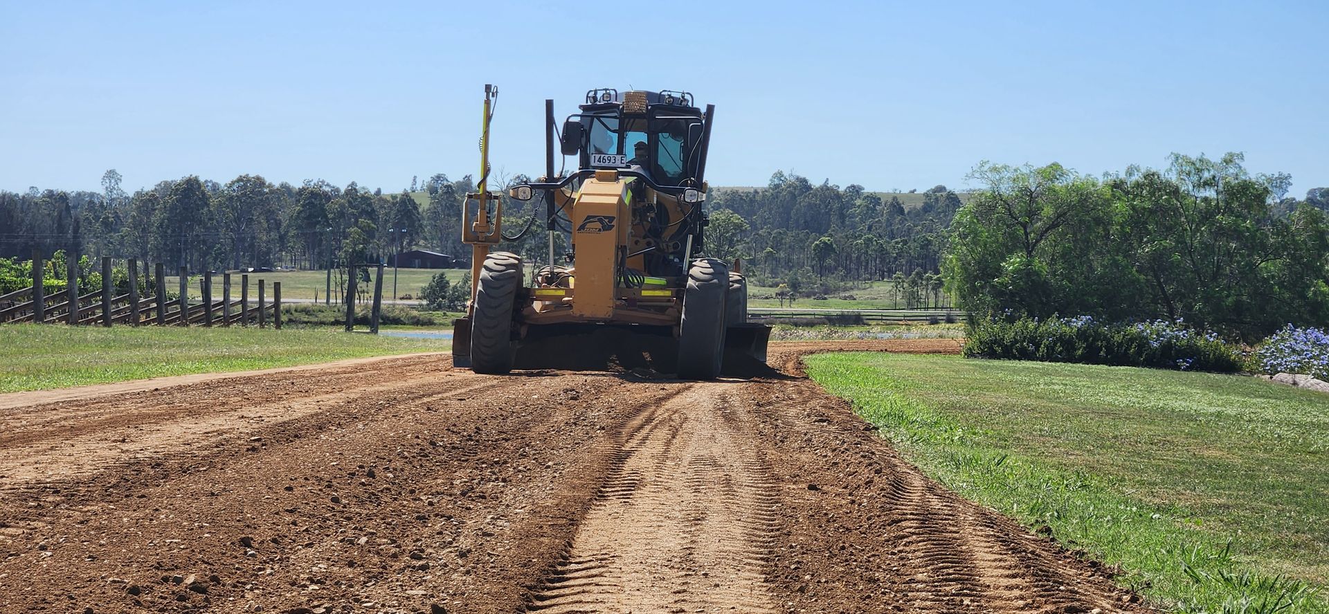Bulldozer is Digging a Hole in the Ground in the Woods — Civil Construction in Newcastle, NSW