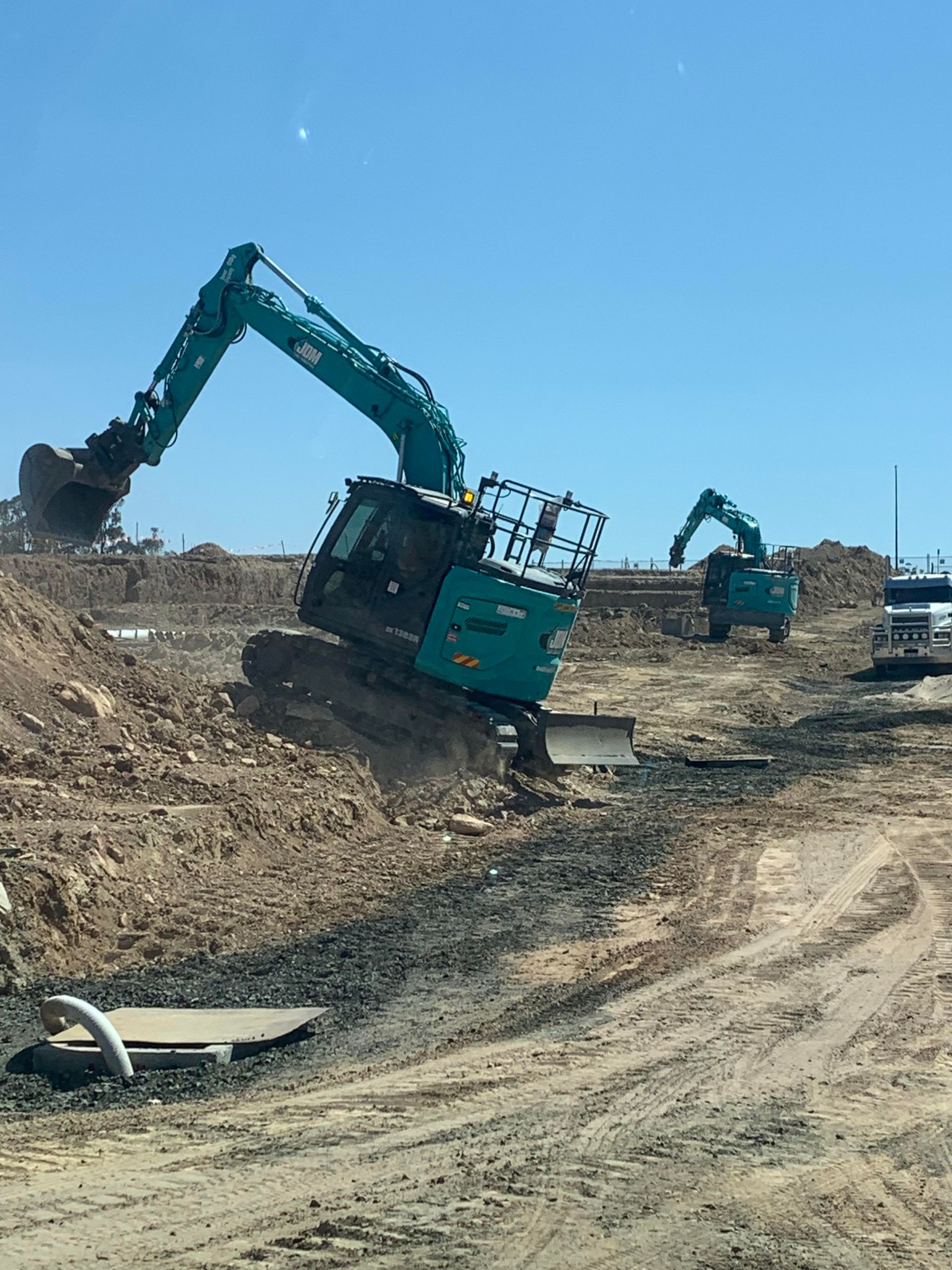 Construction of a Substantial Concrete Structure Underway Amidst a Rural Landscape — Civil Construction in Lake Macquarie, NSW