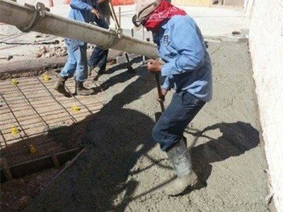 Workers Fixing and Pouring Concrete — Mercedes, TX — Bernal Paving