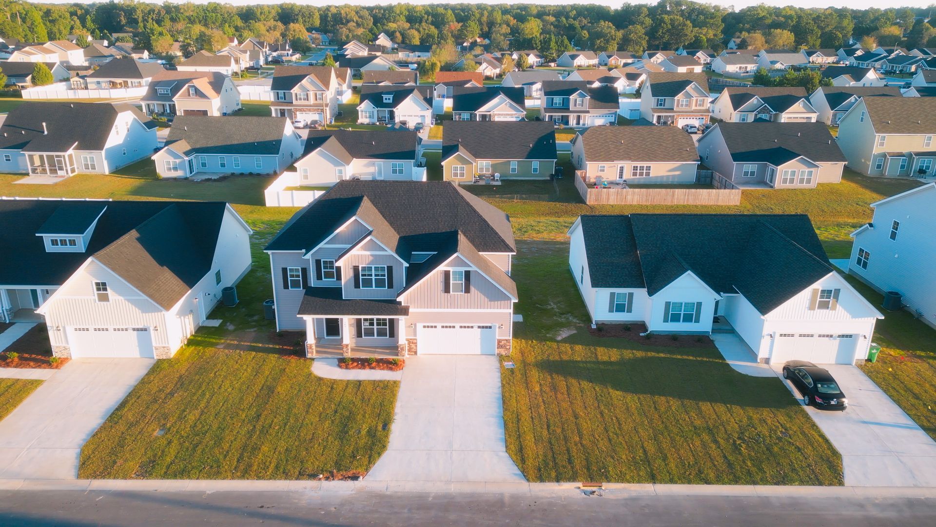 An aerial view of a residential neighborhood with lots of houses.