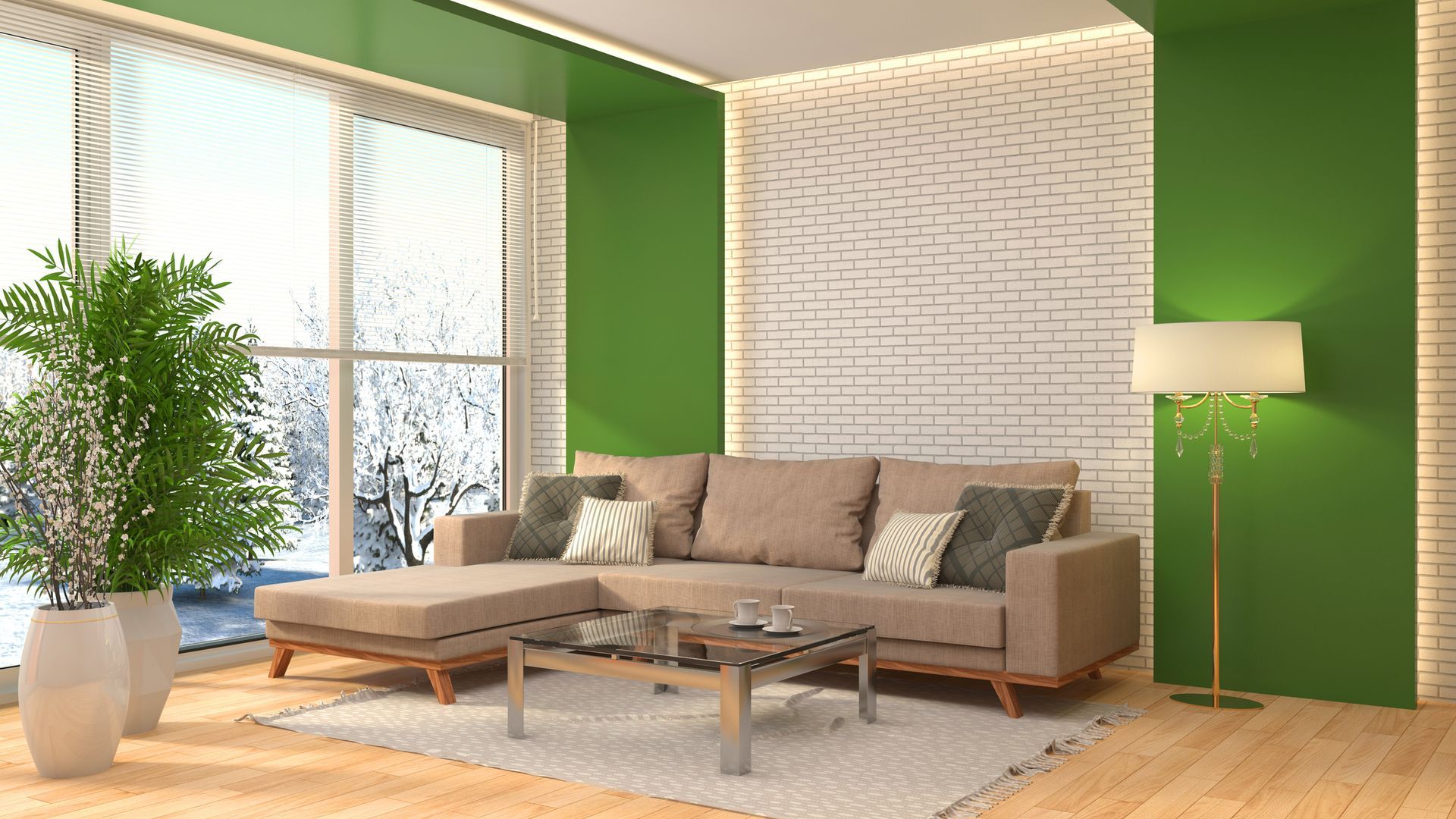 A living room with green walls , a couch , a coffee table and a lamp.