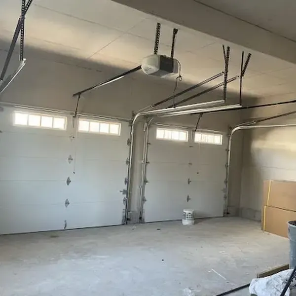 New garage door installation with automatic openers. Professional residential garage door services for smooth operation.