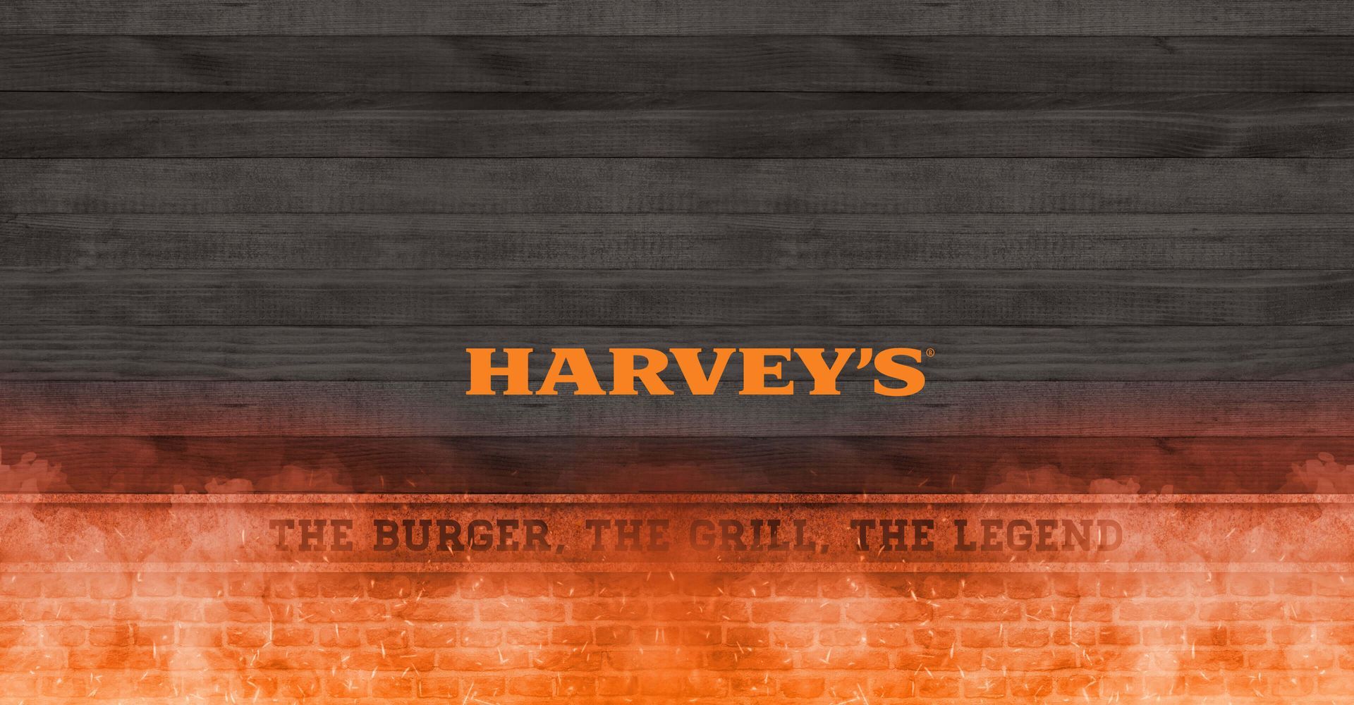A sign for harvey 's the burger the grill the legend