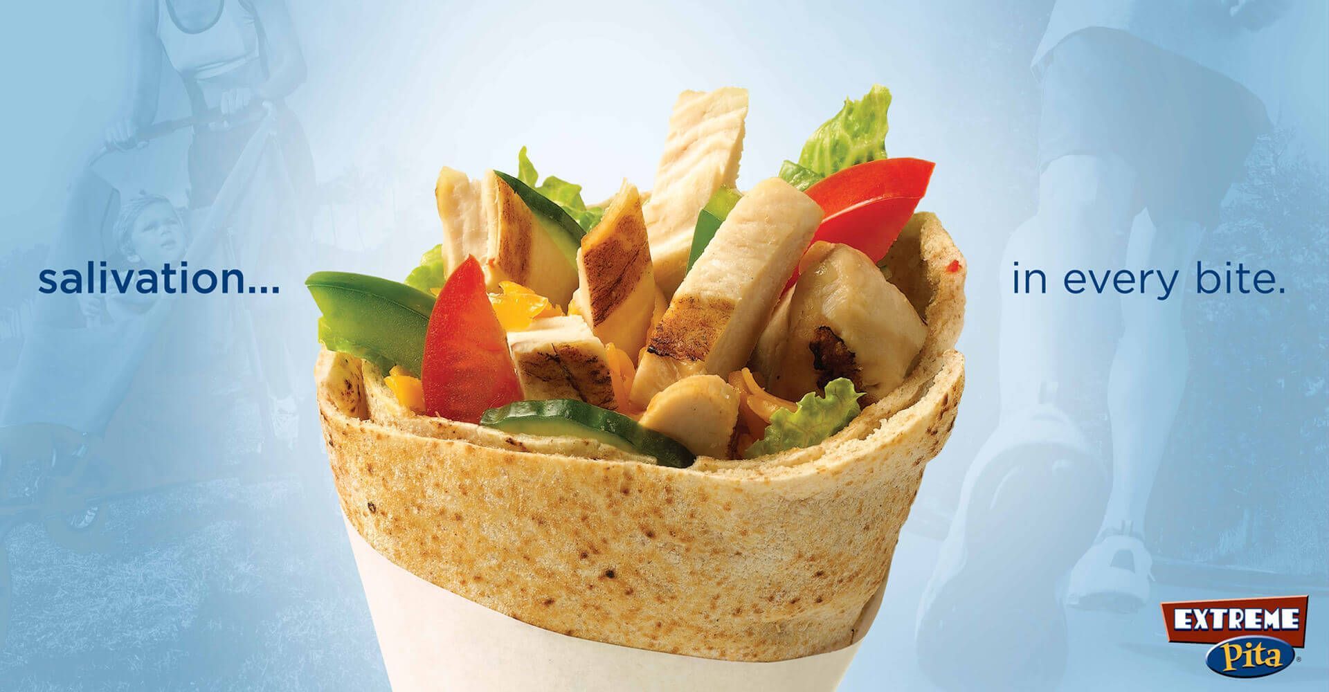 An advertisement for extreme bites shows a wrap filled with chicken and vegetables
