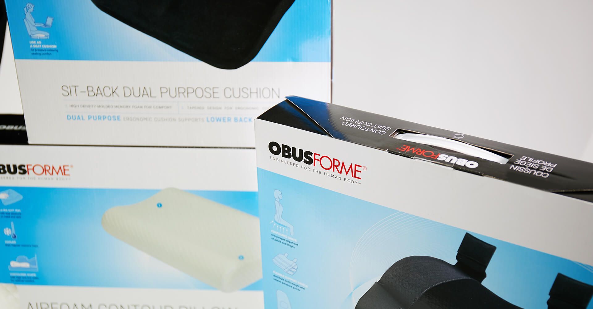 A stack of boxes with one that says ' obus drive ' on it