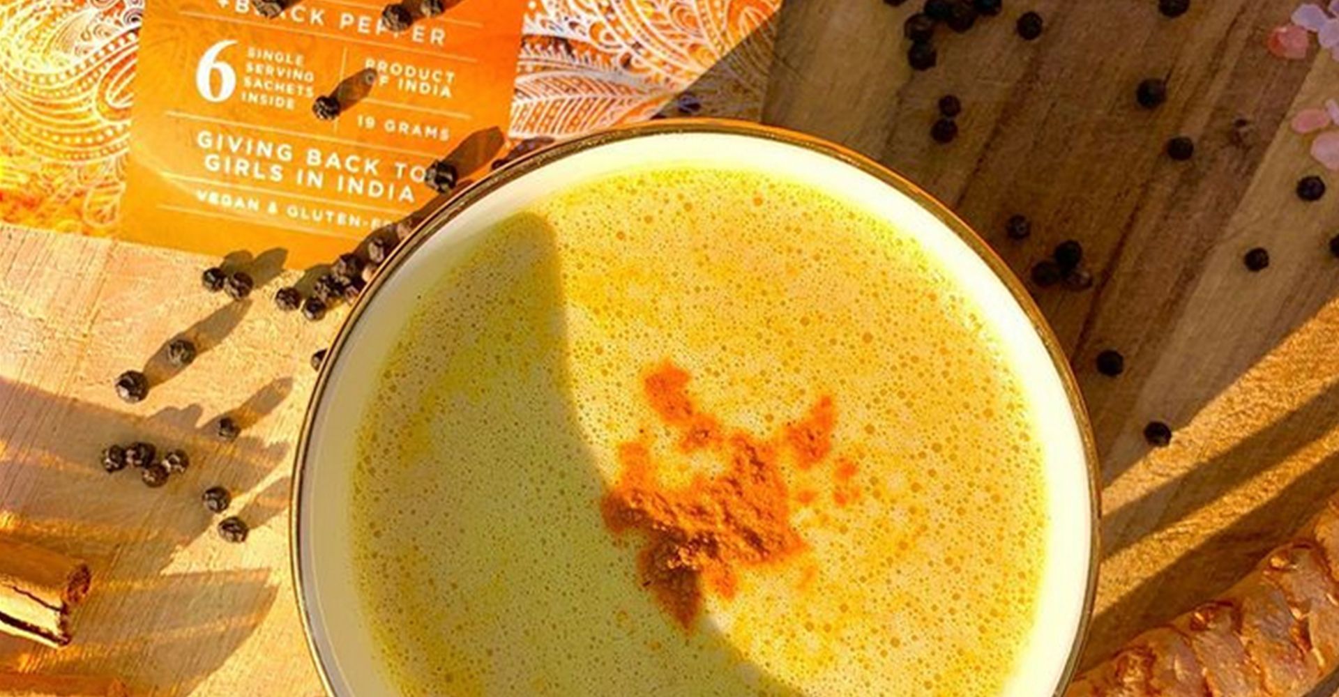 A close up of a bowl of soup on a table.