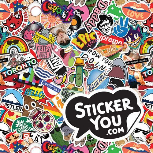 A bunch of stickers are sitting on top of each other on a table.