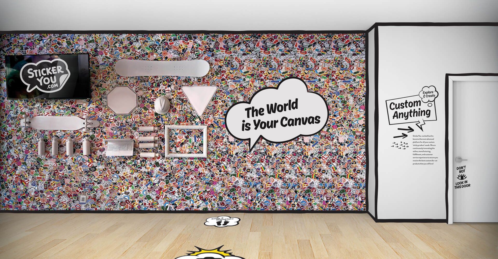 A wall with a speech bubble that says the world is your canvas