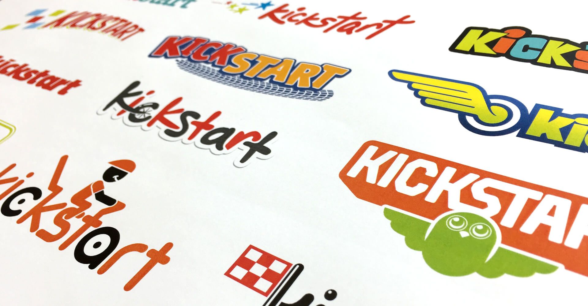 A bunch of logos on a piece of paper including kickstart