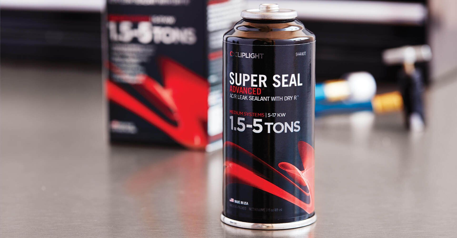 A can of super seal 15-5 tons is sitting on a table.