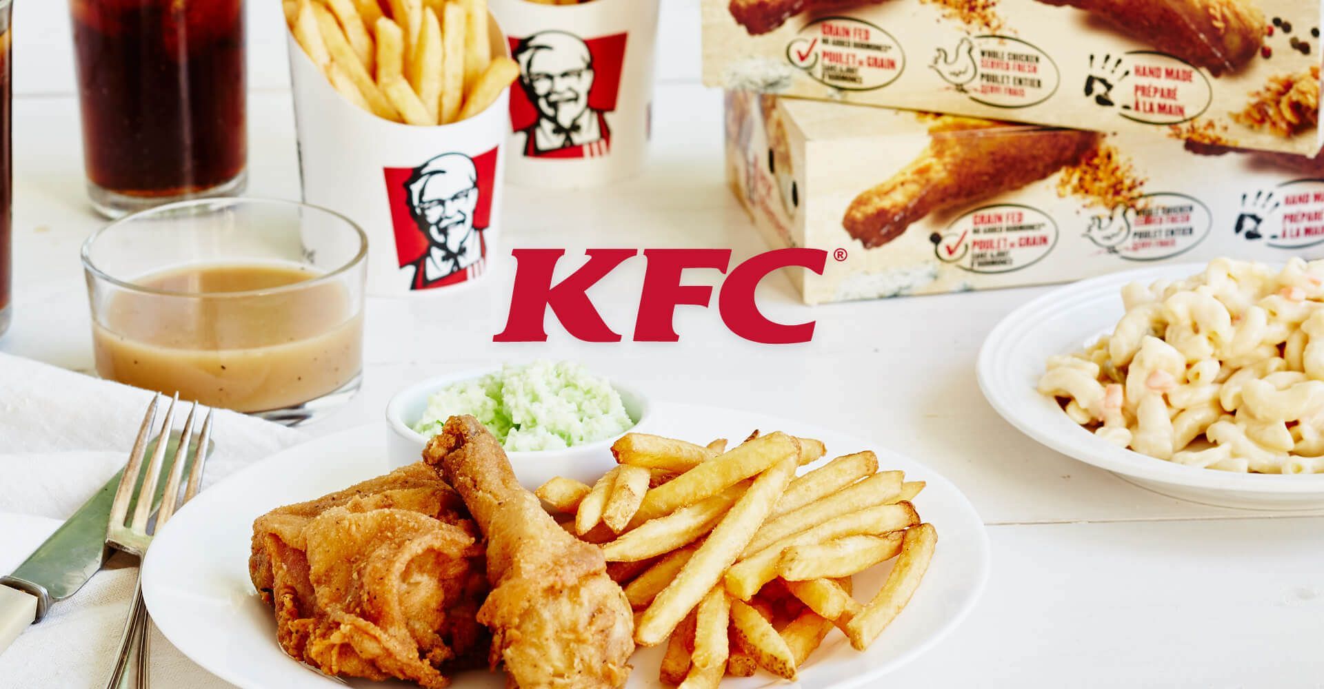 A logo for a company called KFC with a food photography background.