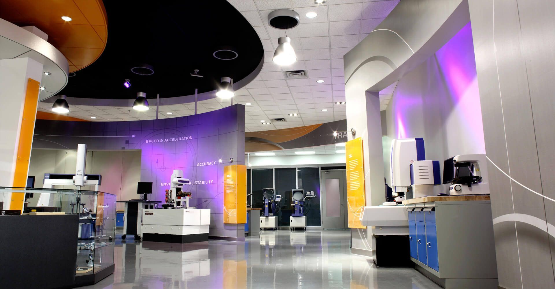 A large room with a lot of purple and orange lights