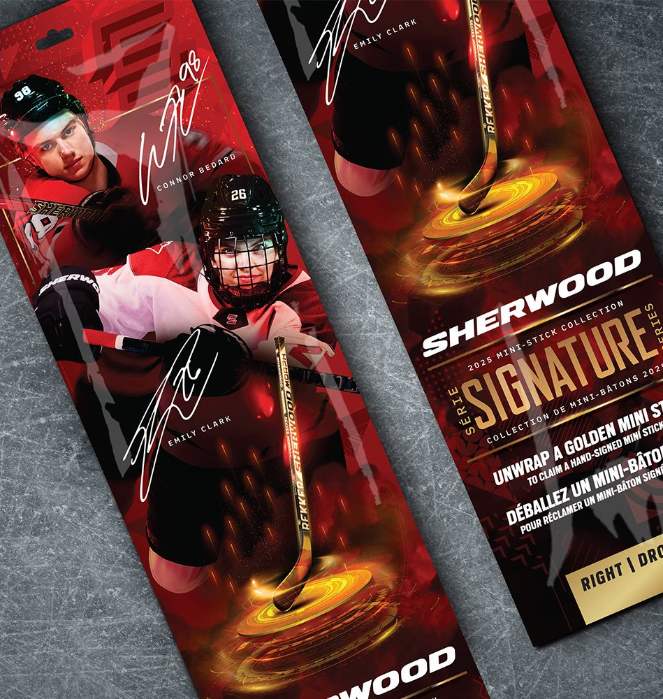 A bowl of sauce surrounded by garlic , lemongrass , onions , and red pepper.