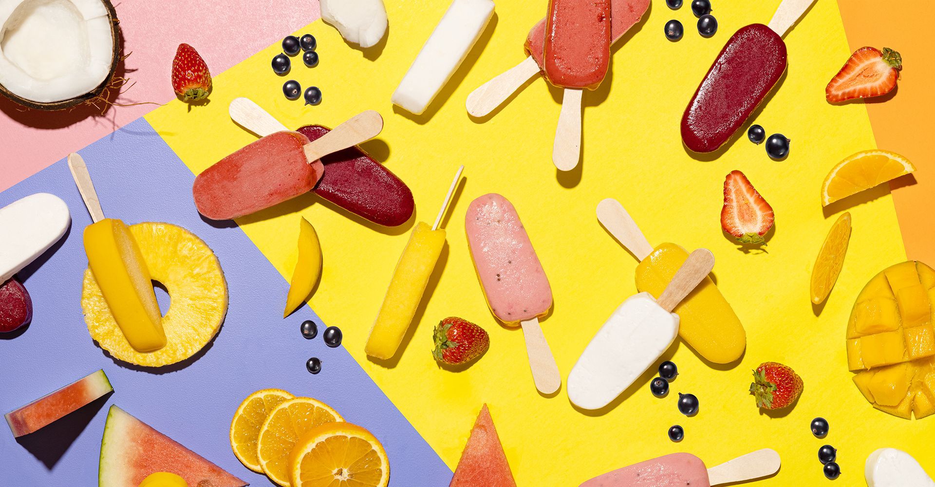 There are many different types of ice cream on a yellow and blue background.