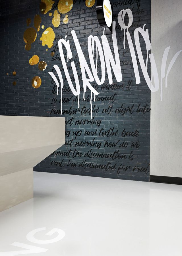 A brick wall with graffiti on it that says 