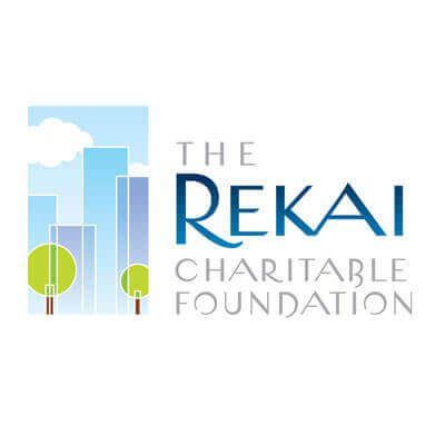 The rekai charitable foundation logo is a blue and white logo with trees and buildings.