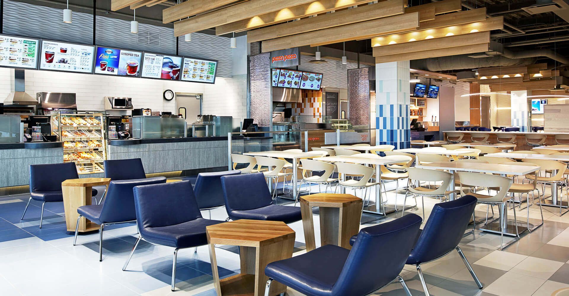 A restaurant with a lot of tables and chairs
