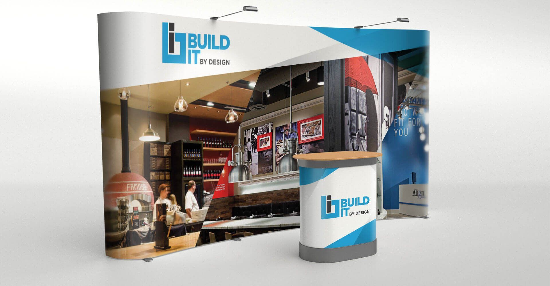 A booth with a table and a sign that says build it.
