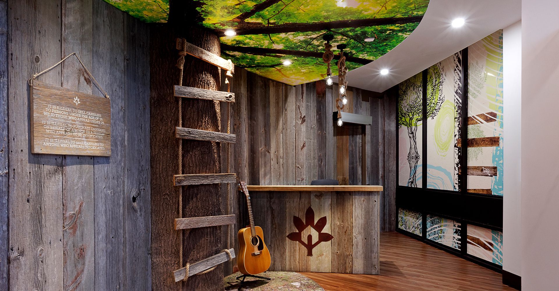 A room with a ladder and a guitar in it.
