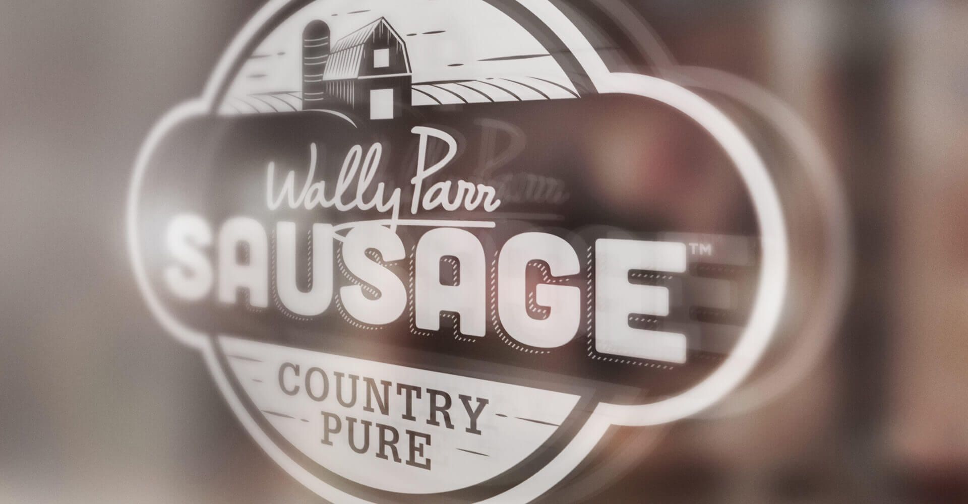 A close up of a sausage logo on a glass