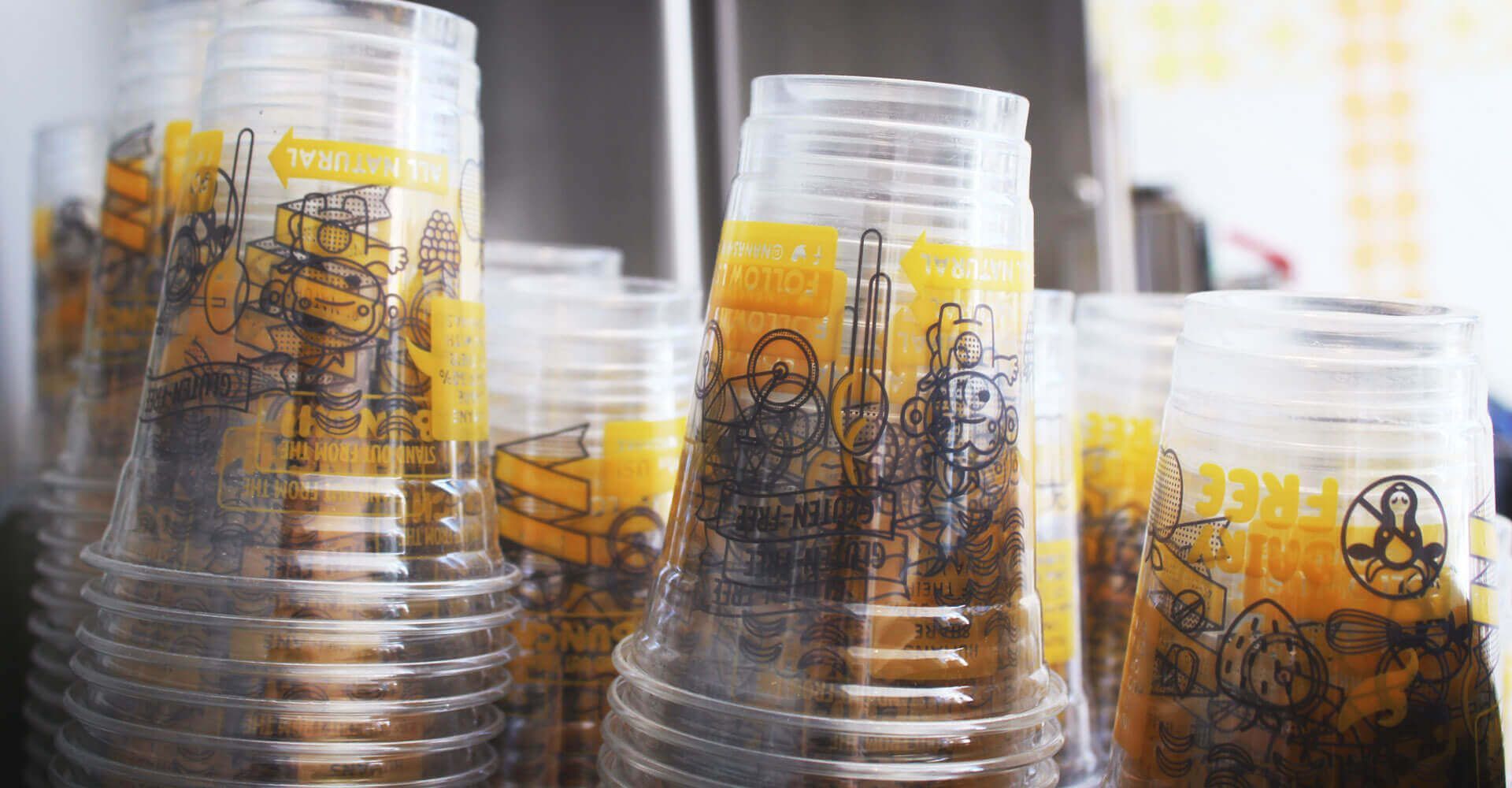 A bunch of plastic cups stacked on top of each other.