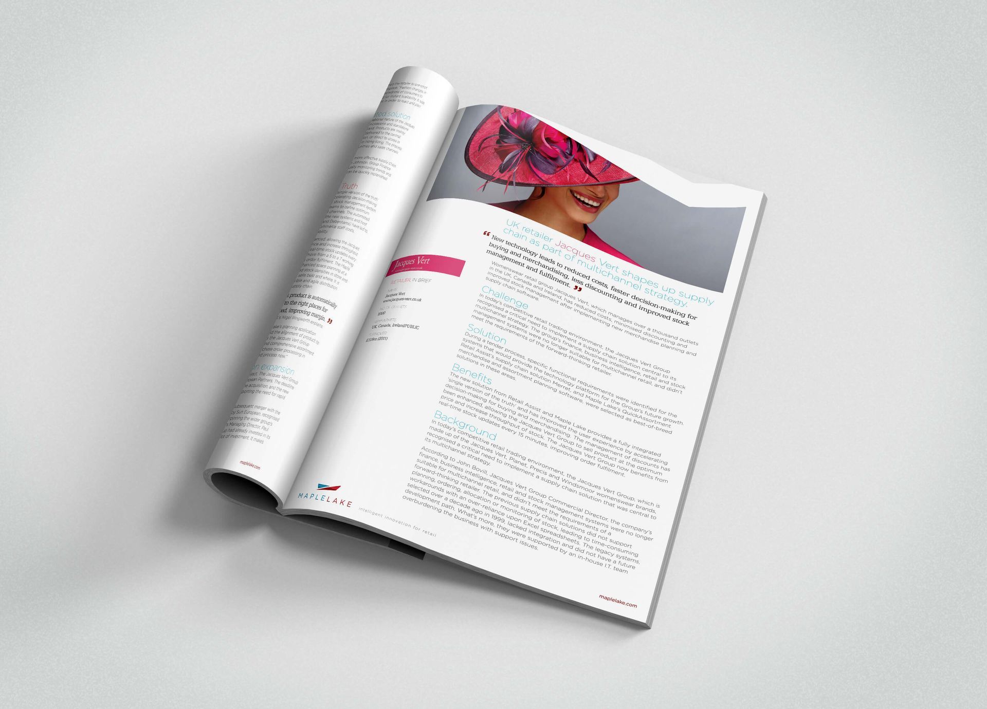 A magazine is open to a page with a picture of a woman wearing a pink hat.