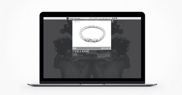 A laptop with a picture of a bracelet on the screen