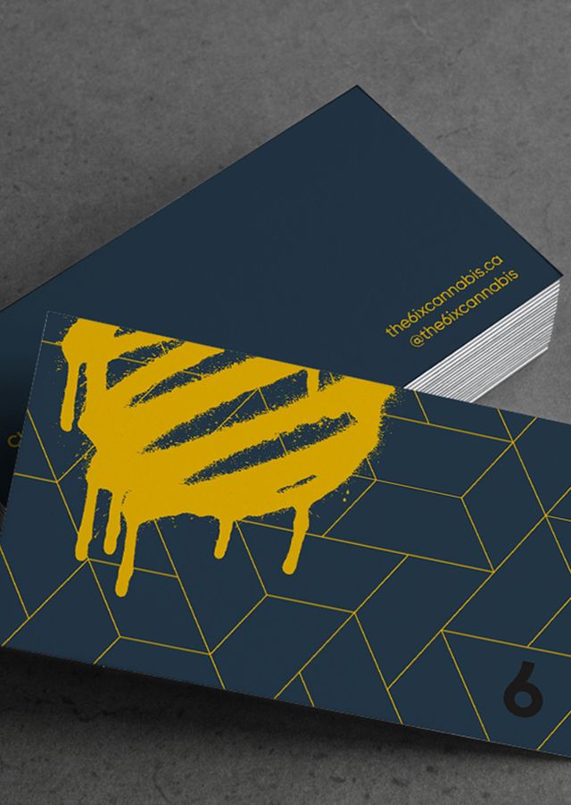 A blue and yellow business card with the number 6 on it