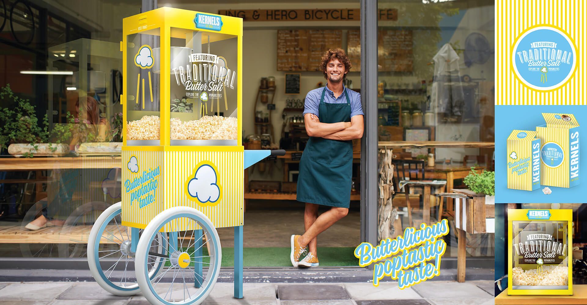 A man is standing in front of a popcorn machine.