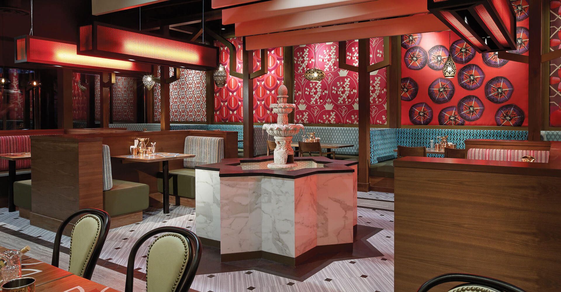 An artist 's impression of a restaurant with tables and chairs