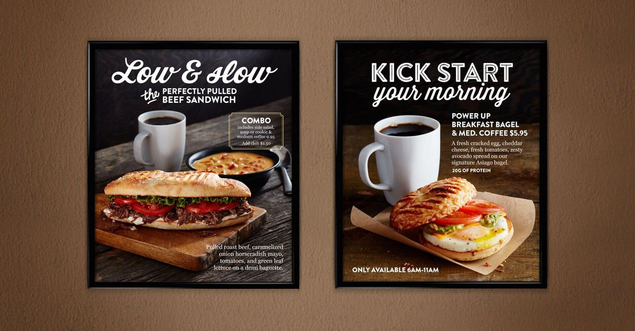 Two posters for a coffee shop with a sandwich and a cup of coffee.