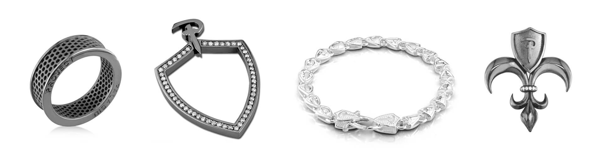 A group of rings and a fleur de lis on a white background.