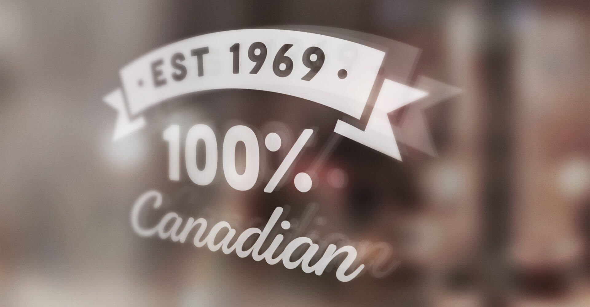 A glass with a sticker on it that says 100 % canadian