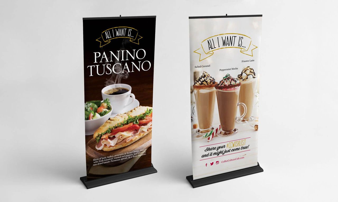 Two banners are sitting next to each other on a table.