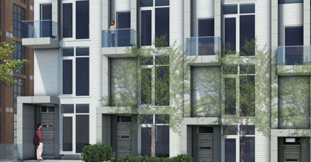 An artist 's impression of a row of apartment buildings