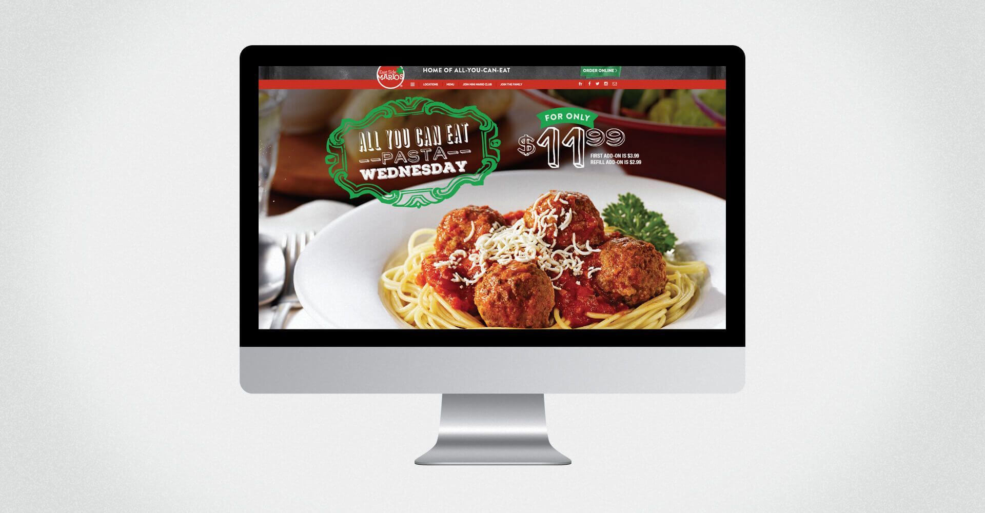 A computer monitor shows a plate of spaghetti and meatballs on the screen.