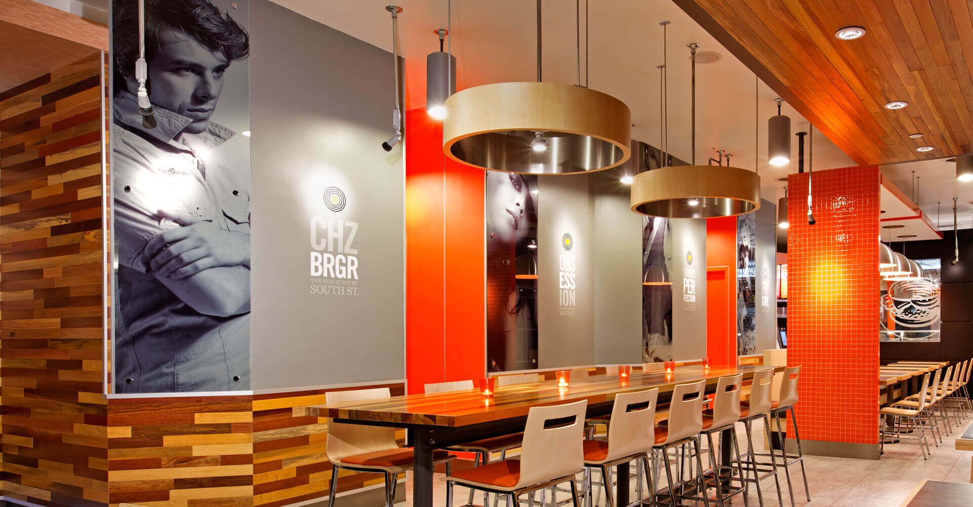 A restaurant with a picture of a man on the wall
