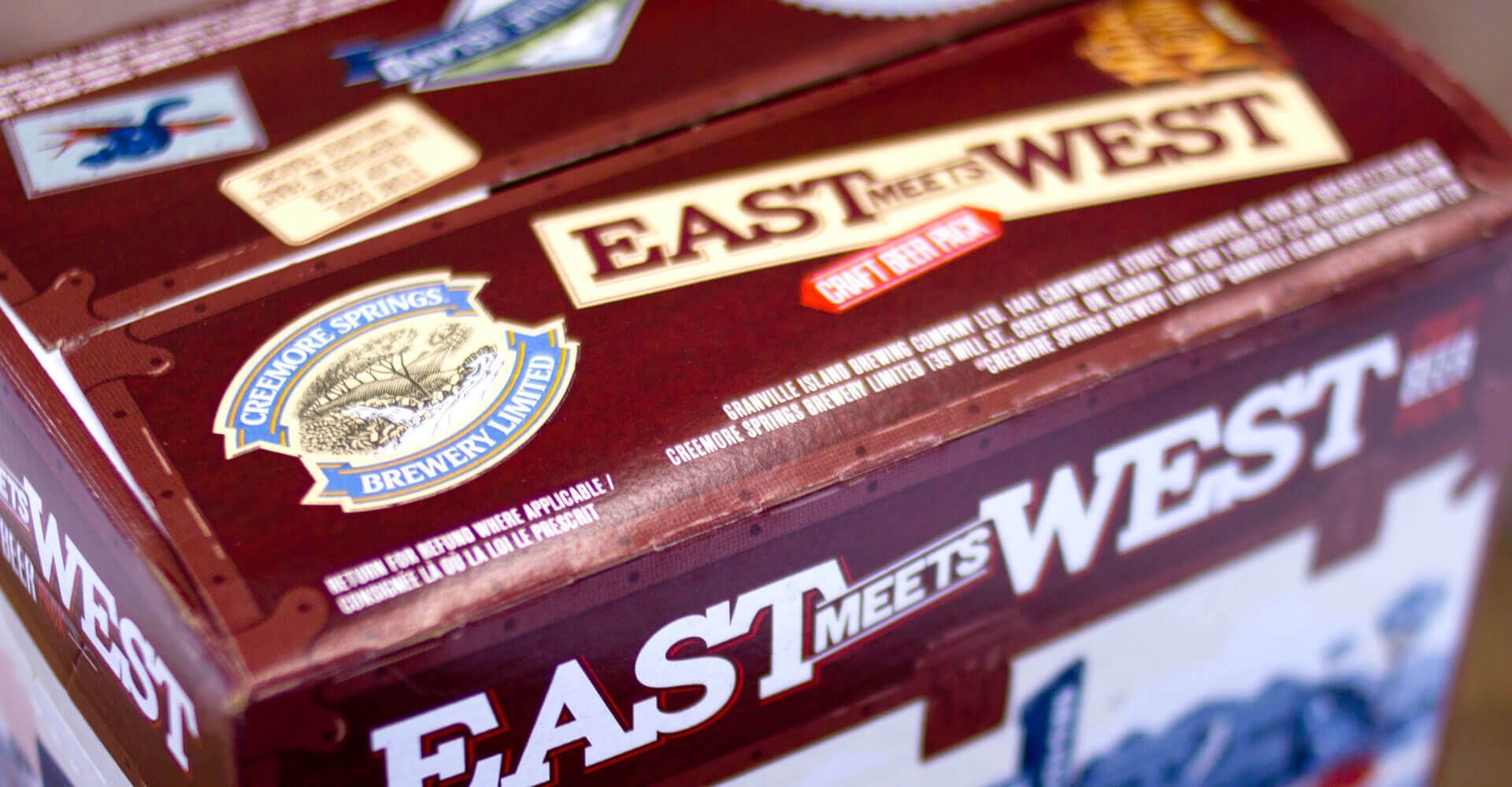 A box that says east meets west on it