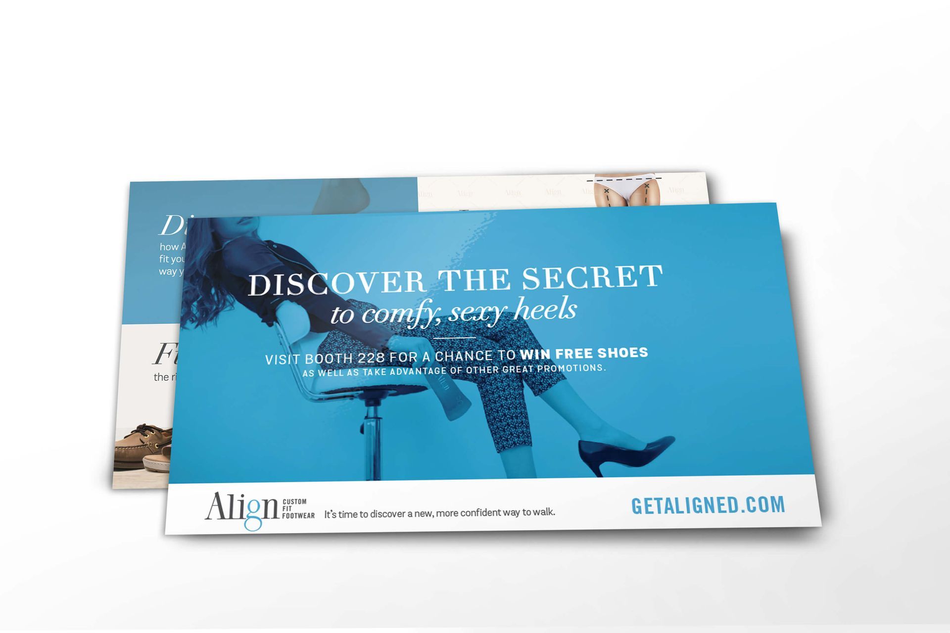 A blue postcard with a picture of a woman 's legs on a chair.