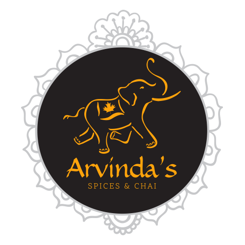 The logo for arvinda 's spices and chai has an elephant on it.
