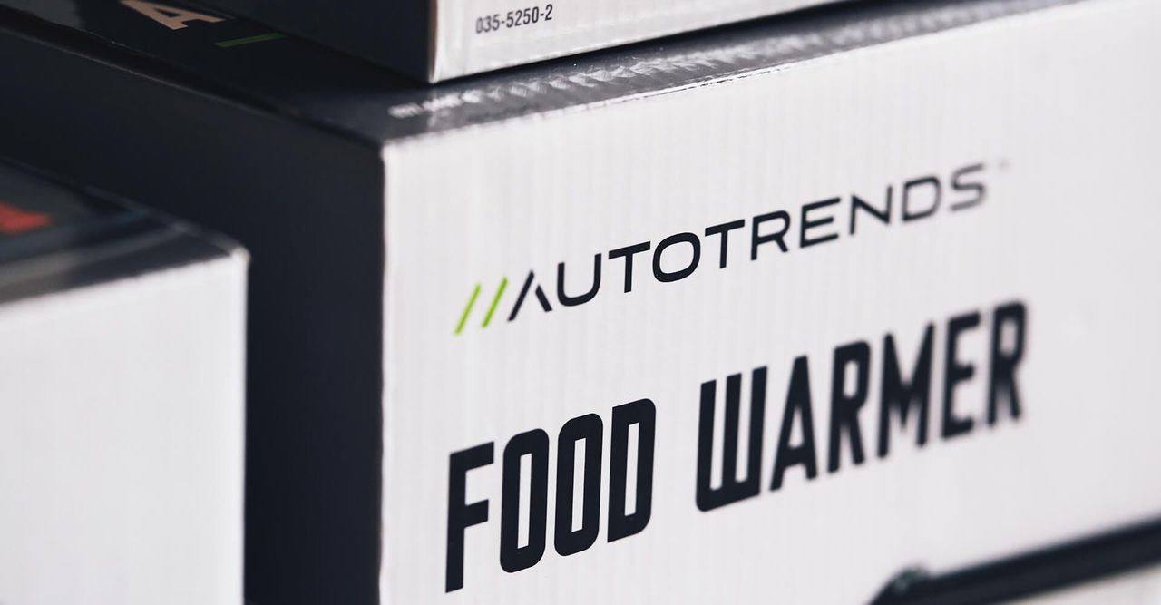 A close up of a box that says food warmer on it.