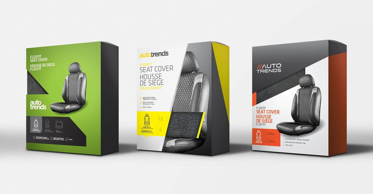 Three boxes of seat covers are sitting next to each other on a white surface.
