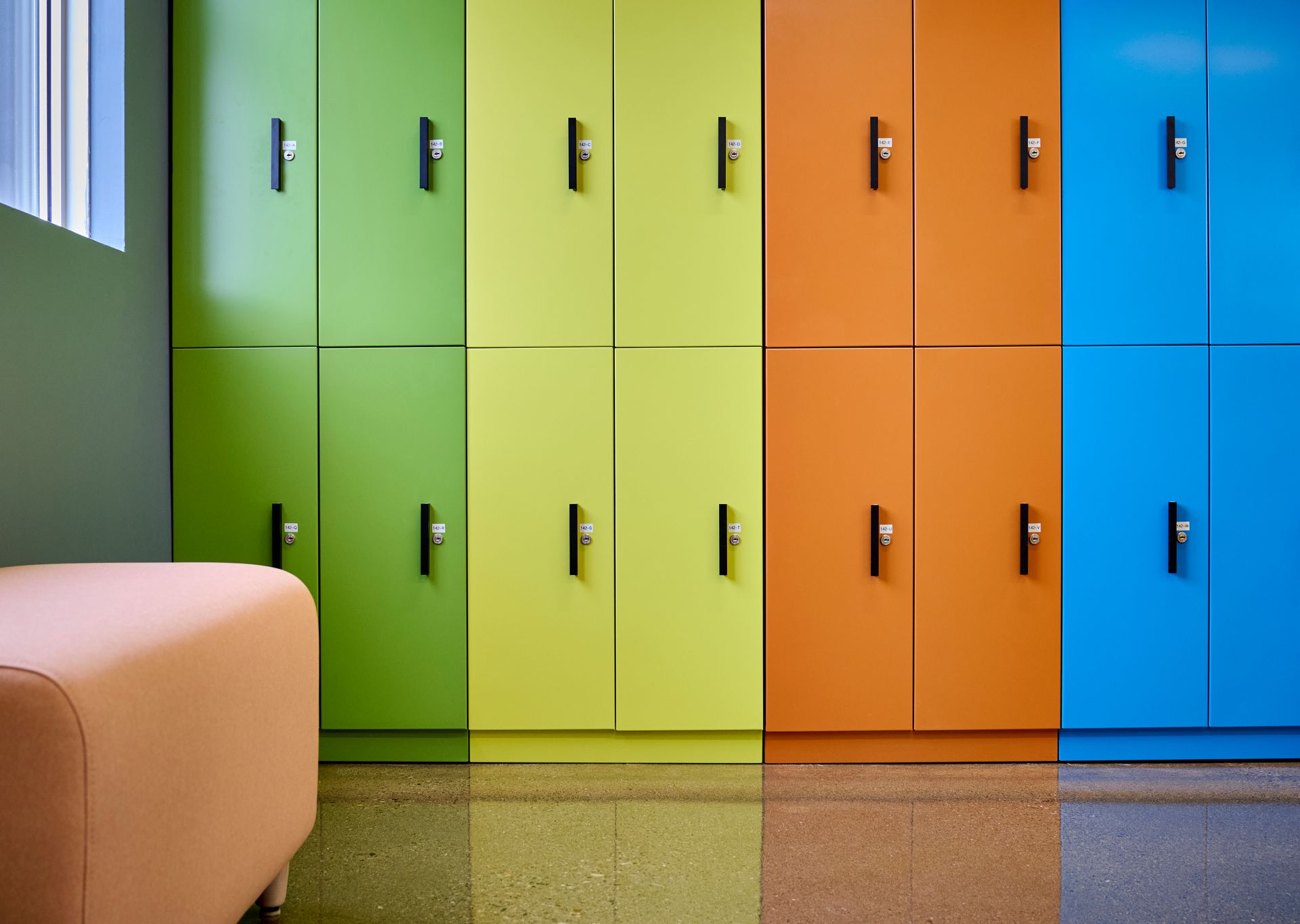A row of colorful lockers in a locker room
