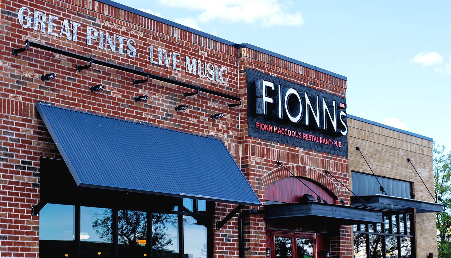A brick building with the word fionne on it