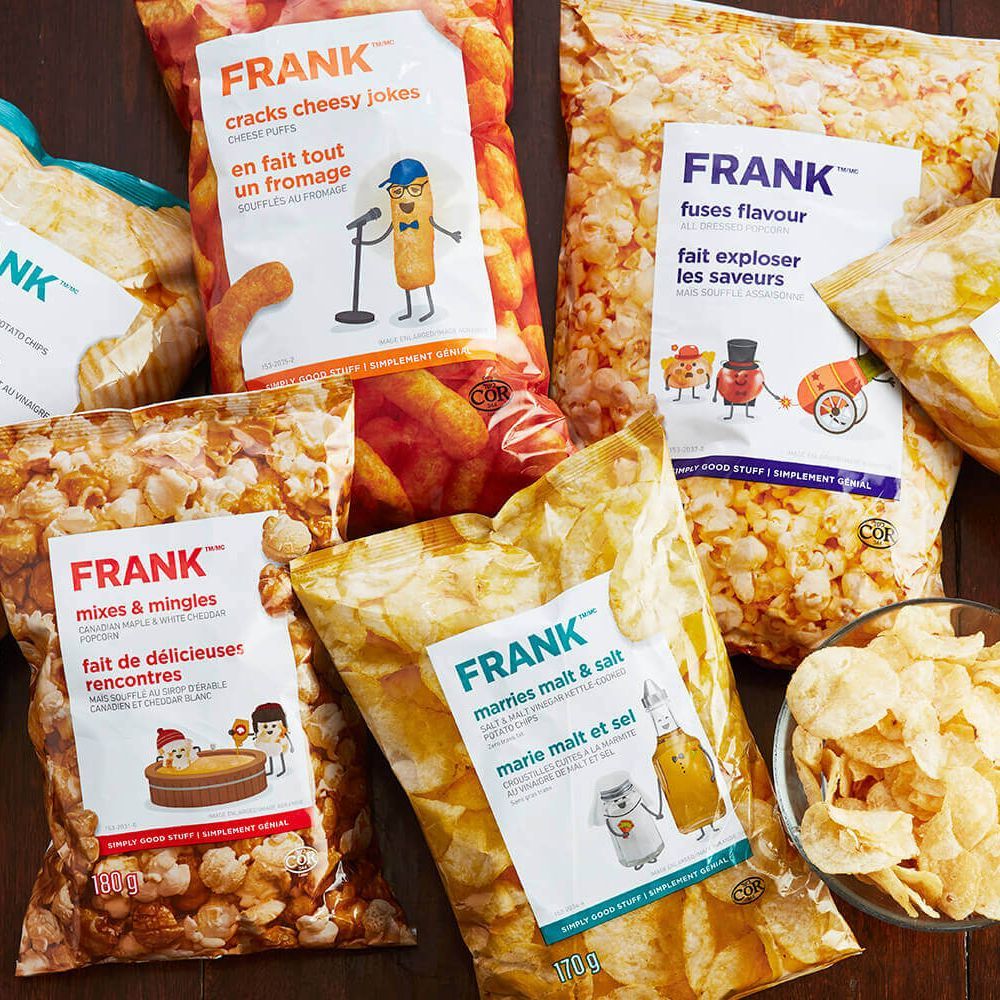 A bunch of bags of frank chips on a table