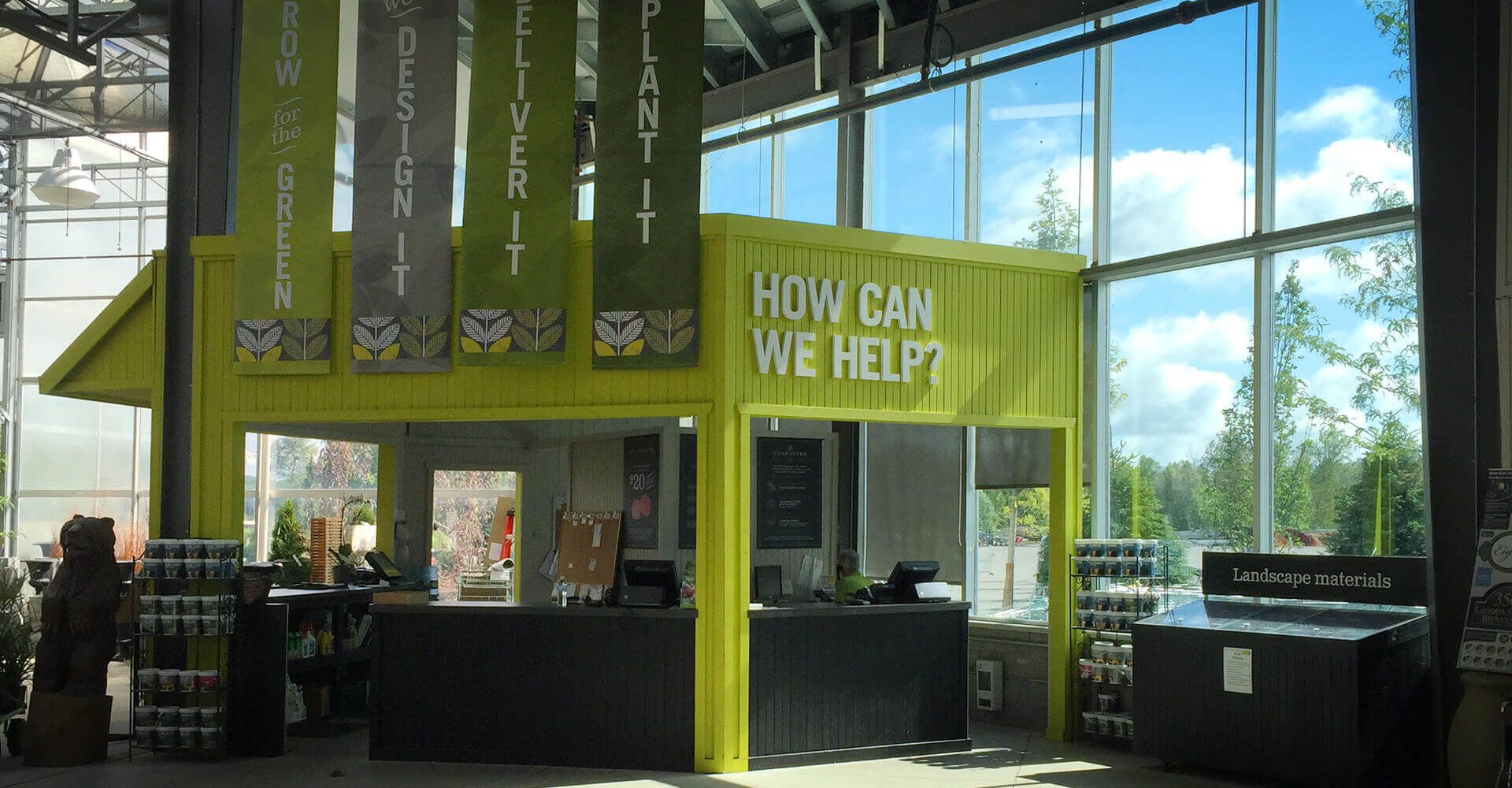A building with a sign that says how can we help